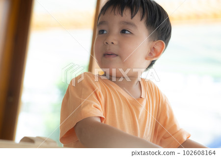 Kid Asian baby boy smile have happy fun playing toys in playroom or a playground 102608164