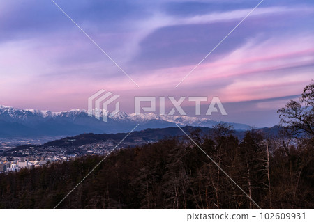 "Nagano Prefecture" The mountains of the Northern Alps and the cityscape and dusk of Matsumoto City "Nagano Prefecture" The mountains of the Northern Alps and the cityscape and dusk of Matsumoto City 102609931