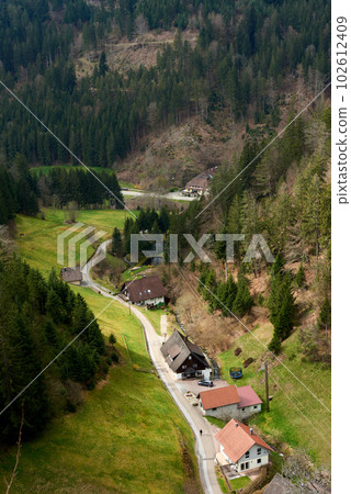 Mountain landscape in the Alps. Panoramic view of beautiful mountain landscape in the Bad Rippoldsau-Schapbach in the Black Forest, area near Burgbach Wasserfall, Baden-Wurttemberg, southern Germany. Mountain landscape in the Alps. Panoramic view of beautiful mountain landscape in the Bad Rippoldsau-Schapbach in the Black Forest, area near Burgbach Wasserfall, Baden-Wurttemberg, southern Germany. 102612409