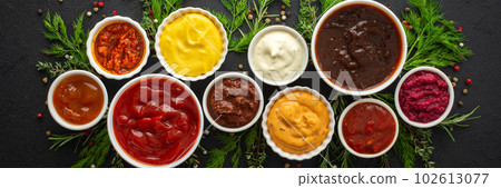 Sauces in bowls with seasonings 102613077