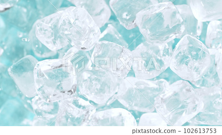 Super slow motion of rotating ice cubes, top view shot Super slow motion of rotating ice cubes, top view shot 102613753