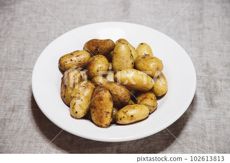 Small May Queen (new potatoes) fried in olive oil 102613813