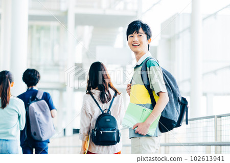 Male and female college students on campus Male and female college students on campus 102613941