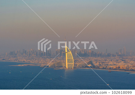Dubai seaside skyline and Burj Al Arab hotel, Dubai 102618099