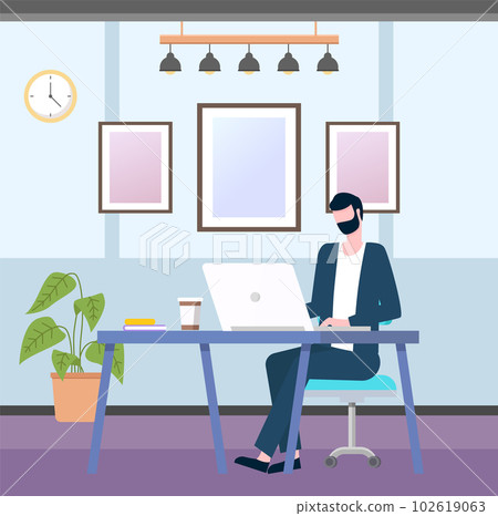 Office worker at the table with a laptop. Businessman or a clerk working at his office workplace 102619063