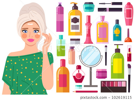 Beautiful girl applying moisturizer cream on her face. Stands with a towel on her head after a bath 102619115