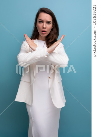 dissenting brunette business women with arms crossed 102619223