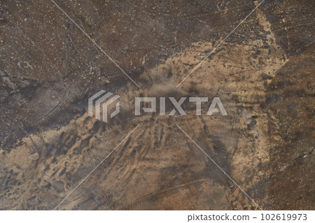 Abstract, mottled textured surface of stone material. Natural rock details with space to copy. Stone background, stone wall background with smooth texture. High quality photo 102619973