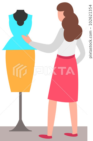 Woman looking on dress at dummy. Female buyer and mannequin with fashionable women s clothing 102621354