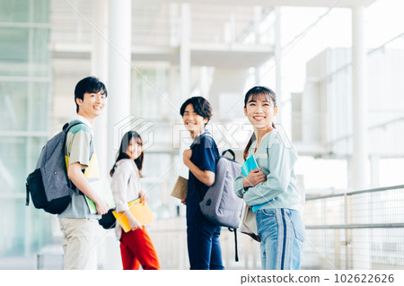 Male and female college students on campus Male and female college students on campus 102622626