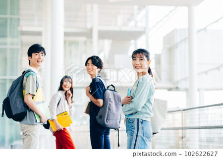 Male and female college students on campus Male and female college students on campus 102622627
