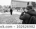 Creativity Banksy in the center of Kyiv, Ukraine on the Maidan, black and white photo 102626982