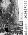 IRPIN, UKRAINE - NOVEMBER 29, 2022: Gymnast with ribbon - Banksy graffiti in Irpin, Ukraine, black and white photo 102627022