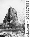 IRPIN, UKRAINE - NOVEMBER 29, 2022: Drawing by Banksy on the wall of a house in Irpin, Ukraine, black and white photo 102627051