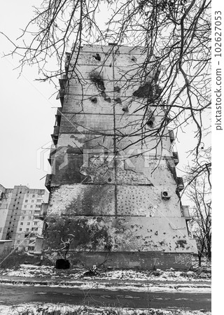 IRPIN, UKRAINE - NOVEMBER 29, 2022: Gymnast with ribbon - Banksy graffiti in Irpin, Ukraine, black and white photo 102627053