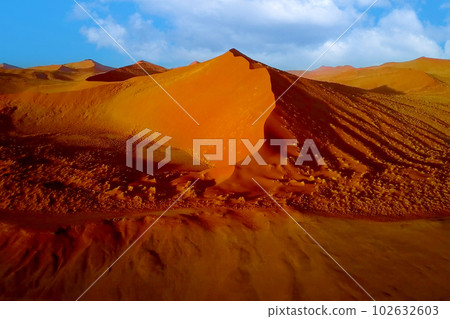 This is a beautiful landscape of the Namib Desert, a famous tourist attraction in Namibia. This is a beautiful landscape of the Namib Desert, a famous tourist attraction in Namibia. 102632603