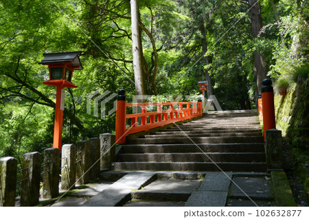 Vermillion-lacquered bridge on the approach to Kurama-dera Temple, Sakyo Ward, Kyoto City Vermillion-lacquered bridge on the approach to Kurama-dera Temple, Sakyo Ward, Kyoto City 102632877