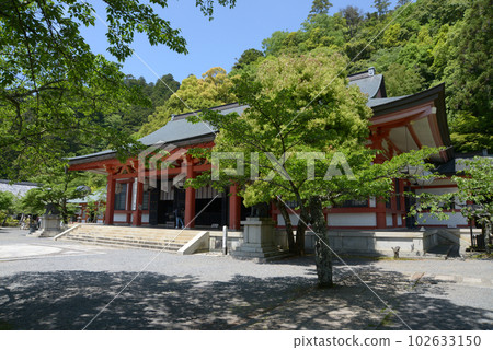 The main hall of Kurama Temple in the fresh greenery of Sakyo Ward, Kyoto City 102633150