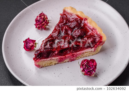 Delicious fragrant sweet pie with cherry berries Delicious fragrant sweet pie with cherry berries 102634092