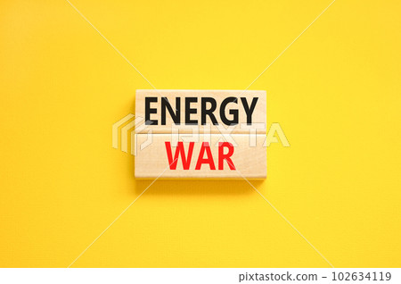Energy war symbol. Concept words Energy war on beautiful wooden block. Beautiful yellow table yellow background. Business and Energy war concept. Copy space. 102634119
