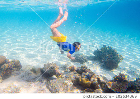Child snorkeling. Kids underwater. Beach and sea. 102634369