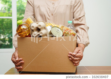 Foodstuffs in donation box for volunteer to help people. 102638407