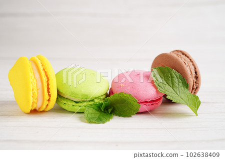 Macaron or french macaroon dessert, cake and cookies on the celebrated birthday. 102638409