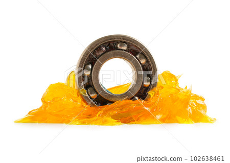 Grease and ball bearing isolated on white background with clipping path, lithium machinery lubrication for automotive and industrial. Grease and ball bearing isolated on white background with clipping path, lithium machinery lubrication for automotive and industrial. 102638461