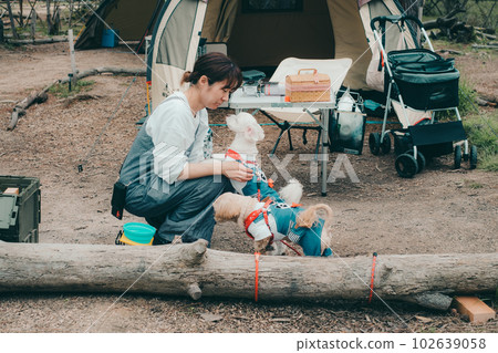 Playing with my dog at a women's solo camp Playing with my dog at a women's solo camp 102639058