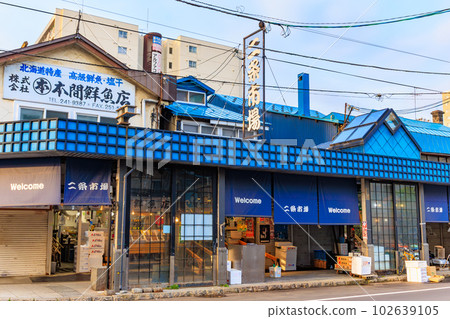 Hokkaido, Sapporo City, Nijo Market, lined with fresh fish shops 102639105