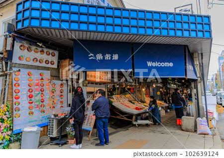 Hokkaido, Sapporo City, Nijo Market, lined with fresh fish shops 102639124
