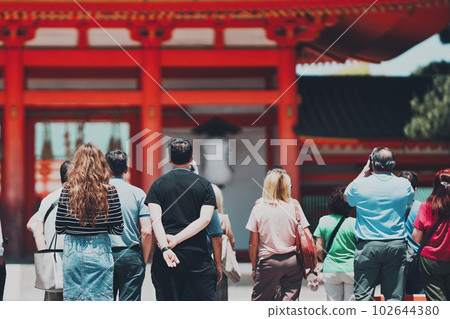 Rear view of tourists Inbound image Rear view of tourists Inbound image 102644380