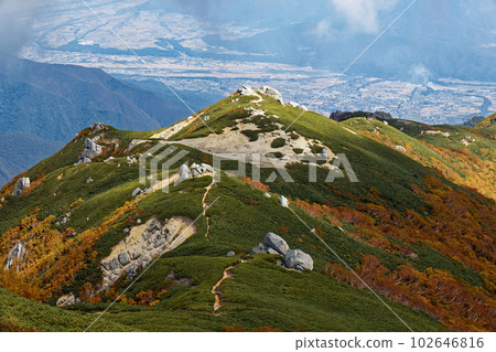 Ikeyama ridge and Komagane city in autumn colors seen from Mt. Utsugidake, Central Alps Ikeyama ridge and Komagane city in autumn colors seen from Mt. Utsugidake, Central Alps 102646816