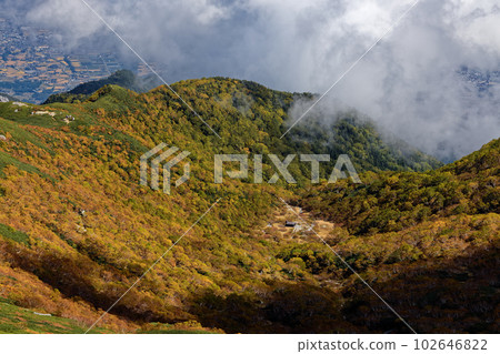 The townscape of Komagane and Utsukidaira in autumn colors seen from Mt. Utsugi in the Central Alps 102646822