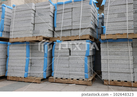 Foam concrete insulation plates on palettes in warehouse 102648323