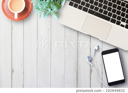 Flat lay home business desk with communication device Flat lay home business desk with communication device 102649832