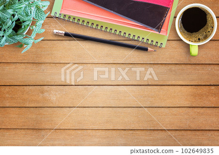 Flat lay wood office desk with office equipment Flat lay wood office desk with office equipment 102649835