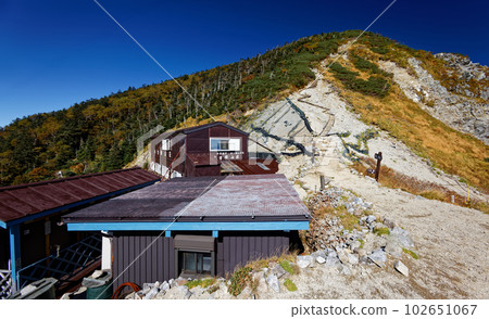 Mt. Higashikawadake, Central Alps with colored leaves seen from Kisodonokoshi 102651067