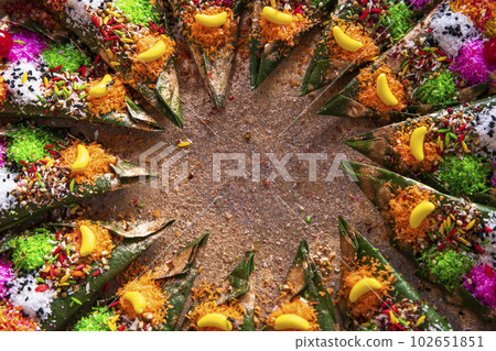 Decorated Bangladeshi Traditional garnish Colorful  masala kasturi paan or betel leaf      102651851