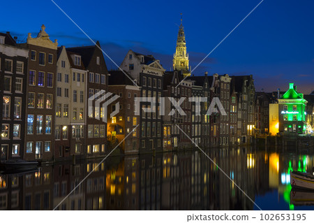 Dutch dancing houses at the Amsterdam canal in Holland. 102653195