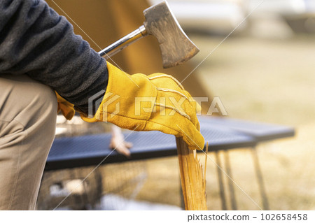 Chopping firewood ax camping Chopping firewood ax camping 102658458