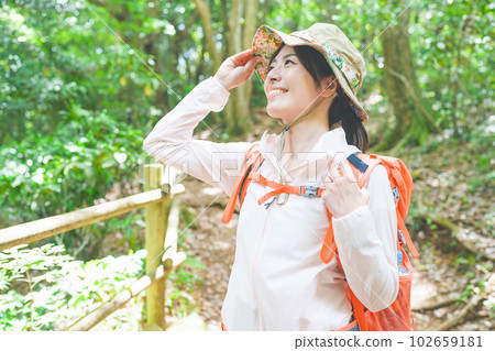 outdoor enthusiasts enjoying mountain climbing 102659181
