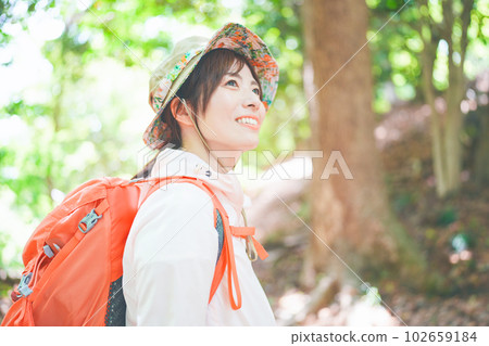 Profile of a woman who enjoys climbing 102659184