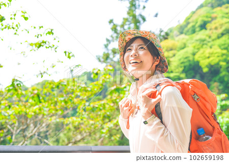 A woman enjoying climbing 102659198