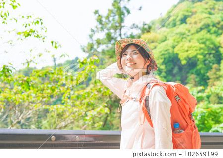 A woman enjoying climbing 102659199