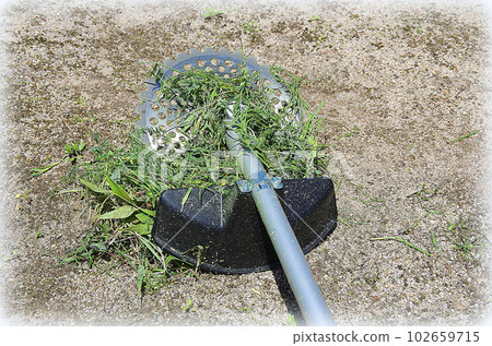 Grass wrapped around the blade of the mower (illustration style) Grass wrapped around the blade of the mower (illustration style) 102659715