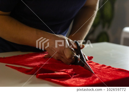 Homemade sewing of Christmas hat Homemade sewing of Christmas hat 102659772
