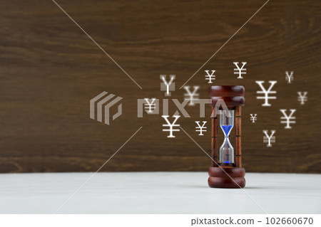Time and money flow image: hourglass and circle mark Time and money flow image: hourglass and circle mark 102660670