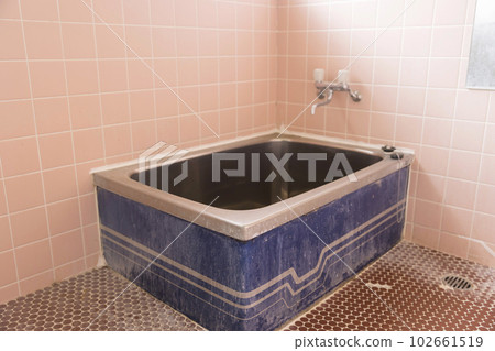 Aged tiled bathroom Aged tiled bathroom 102661519