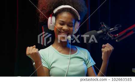 Game streamer using pc setup playing multiplayer first person shooter Game streamer using pc setup playing multiplayer first person shooter 102663585